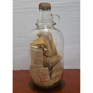 Lot of B&W Raleigh Cigarettes Cigarette Coupons in Glass Jug Uncounted